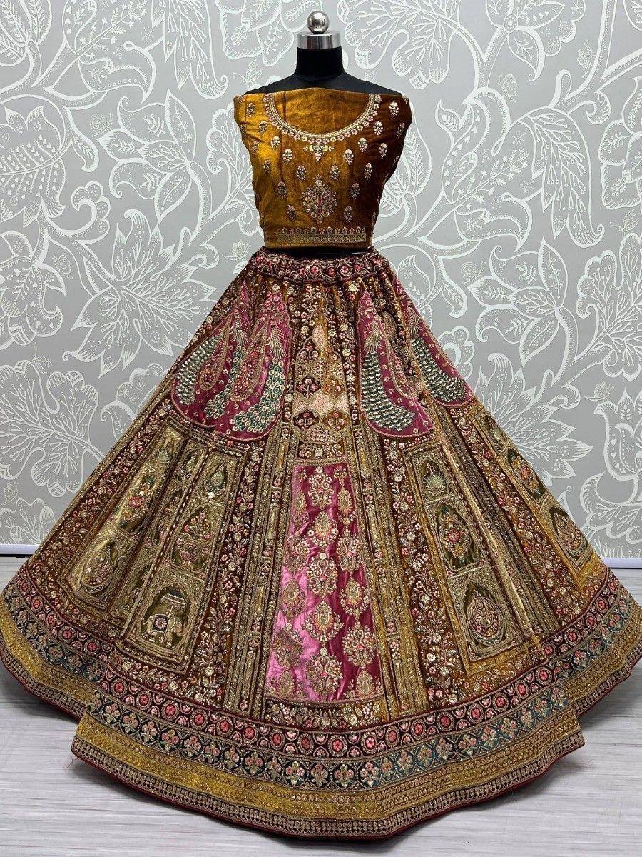 Designer lehenga choli with intricate gold embroidery and vibrant pink-gold skirt, perfect for Indian ethnic wear.