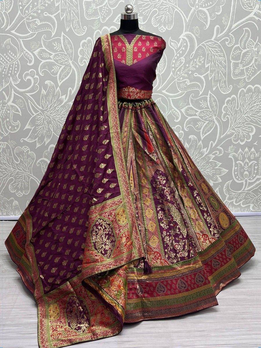 Purple and gold designer lehenga choli with intricate embroidery and matching dupatta, perfect for Indian ethnic occasions.