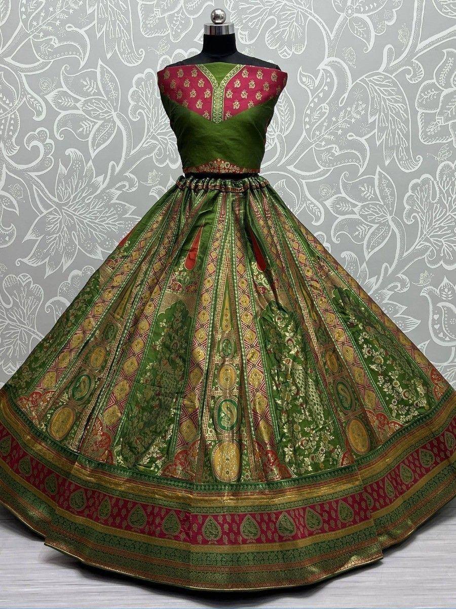 Green and red designer lehenga choli with gold embroidery, perfect for Indian ethnic wear occasions