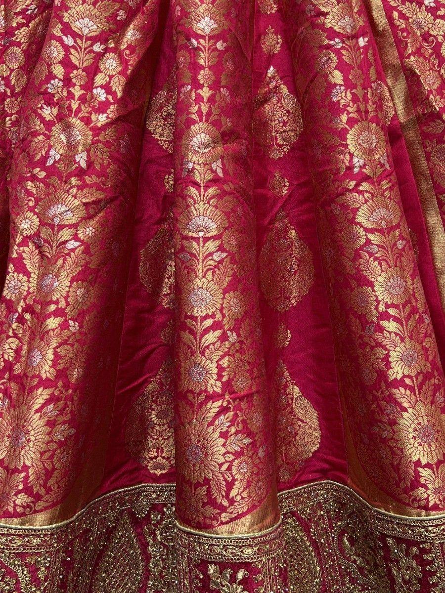 Rich maroon lehenga with gold floral brocade and embroidered border, ideal for Indian ethnic wear