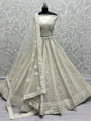 Magnetic Off-White Thread Work Net Lehenga Choli with Dupatta
