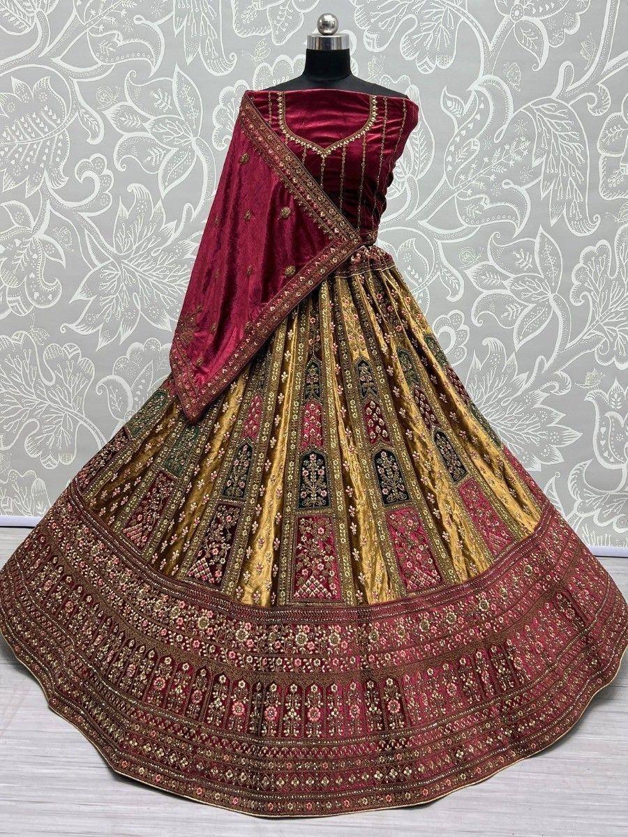 Maroon and gold embroidered lehenga choli with velvet blouse, perfect for Indian weddings and festive occasions