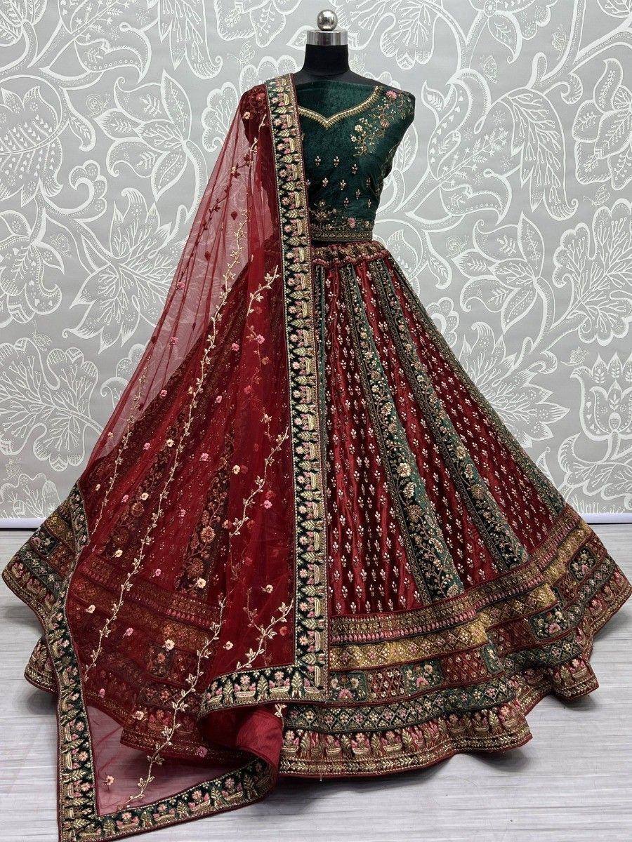 Emerald green and maroon designer lehenga choli with floral embroidery and net dupatta, perfect for Indian weddings