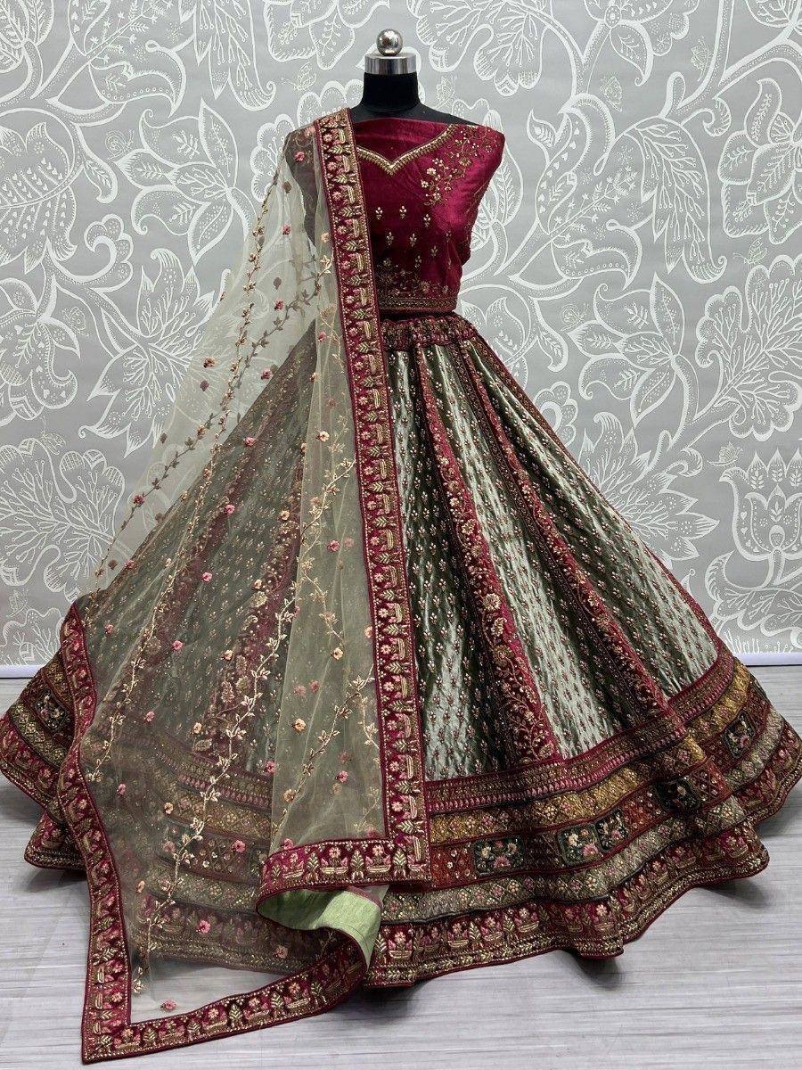 Maroon and olive green designer lehenga choli with intricate embroidery and floral dupatta, perfect for weddings