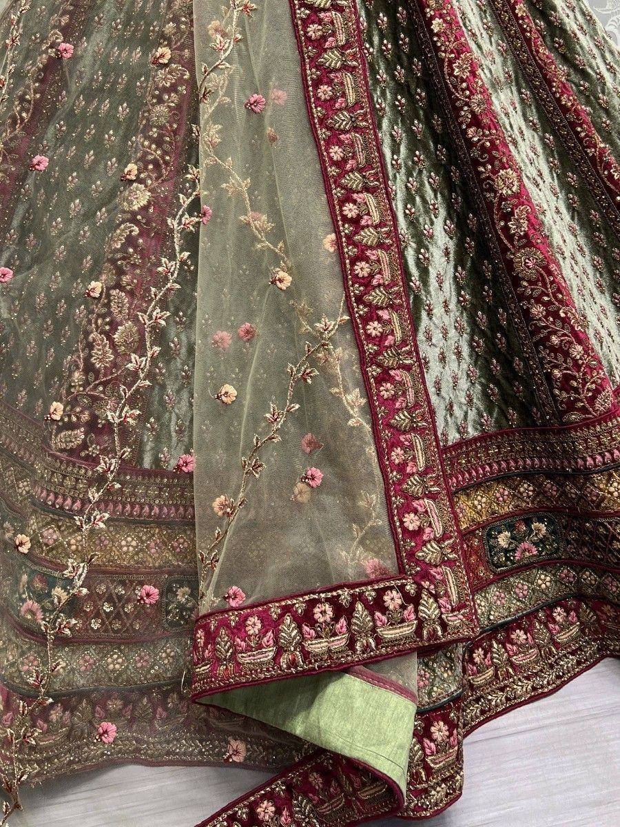 Green velvet lehenga with maroon embroidery and floral net dupatta, Indian ethnic wear