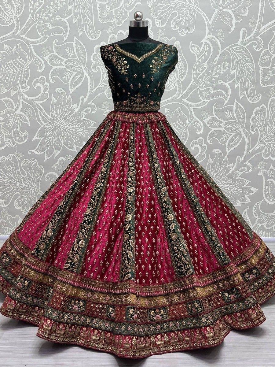 Emerald green and maroon designer lehenga choli with gold embroidery, perfect for weddings and festivals