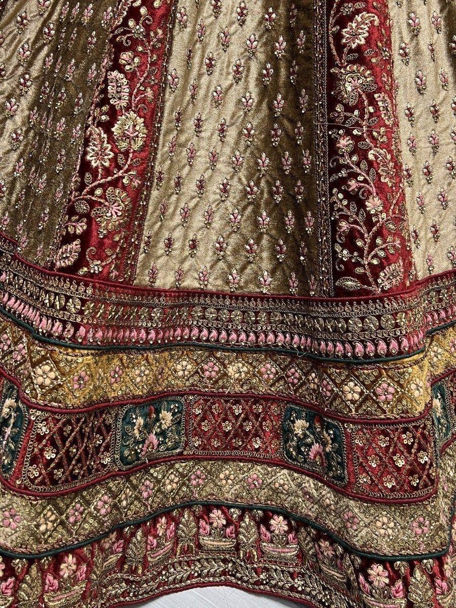 Luxury Indian lehenga with gold and maroon velvet, intricate floral embroidery and sequin work