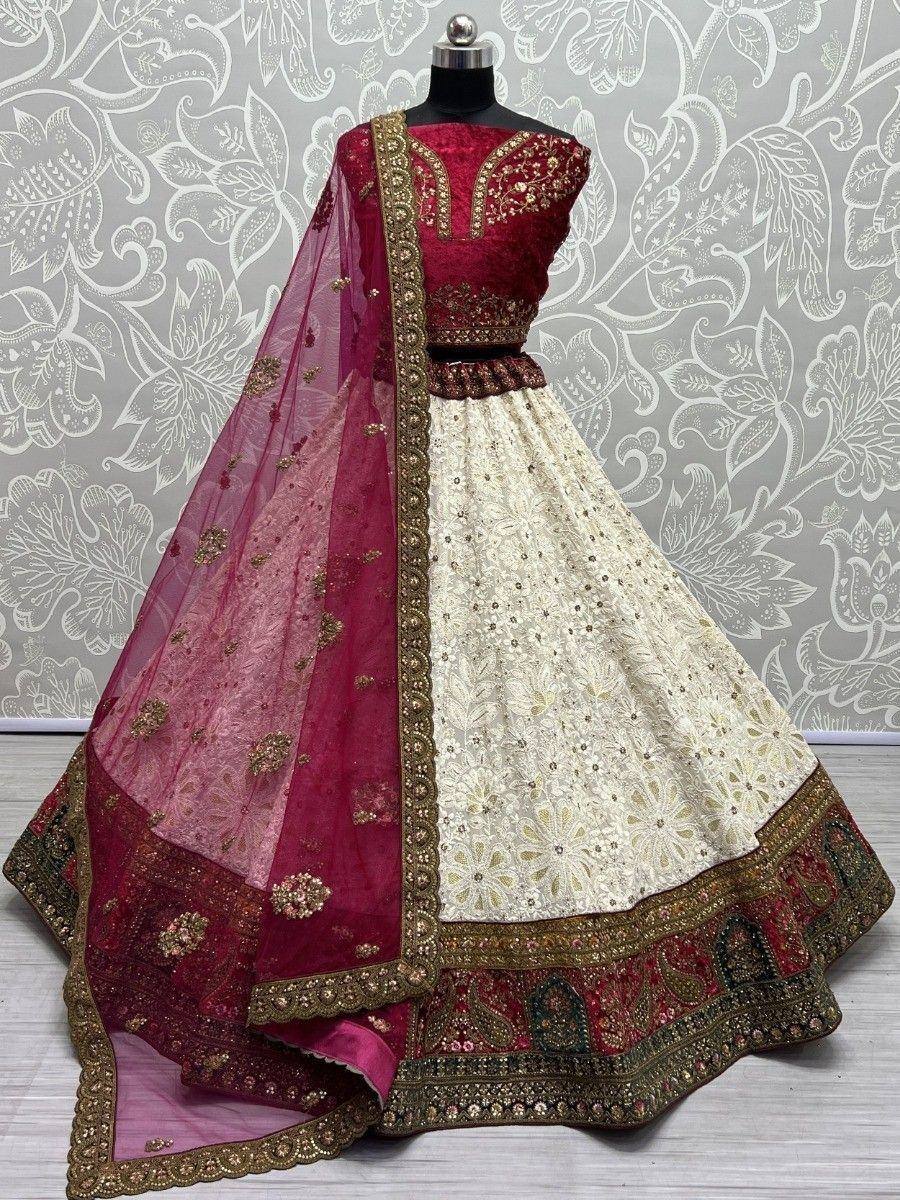 Maroon and cream designer lehenga choli with gold embroidery and sheer dupatta, perfect for Indian weddings