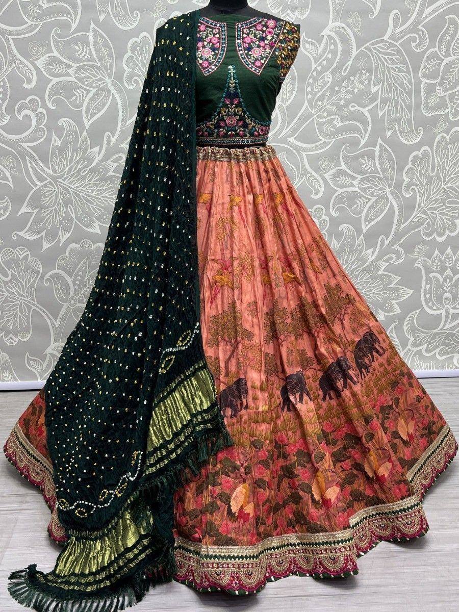 Green embroidered blouse with peach elephant-print lehenga and matching dupatta, Indian ethnic wear