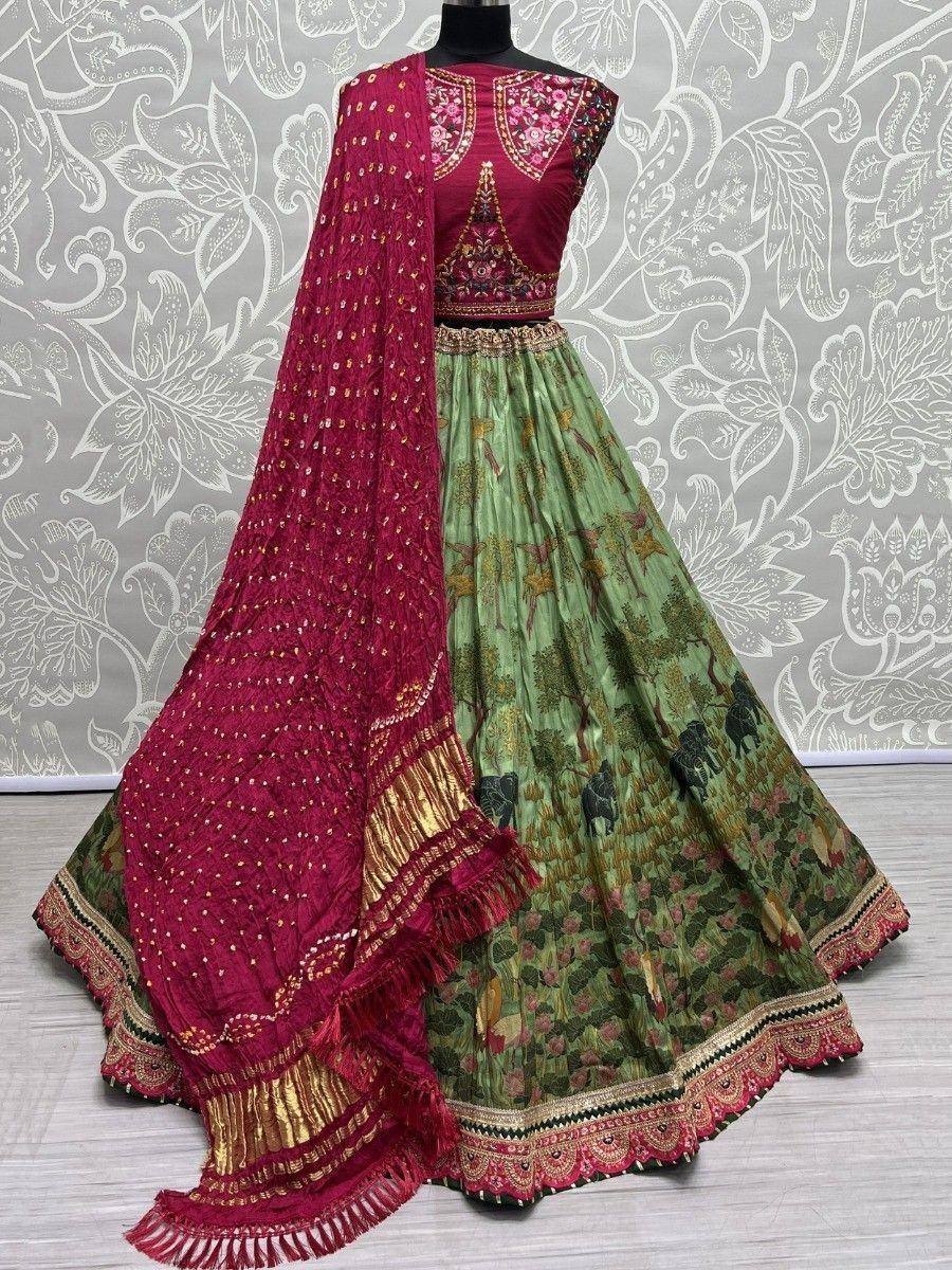 Maroon and green designer lehenga choli with elephant print skirt and embroidered dupatta
