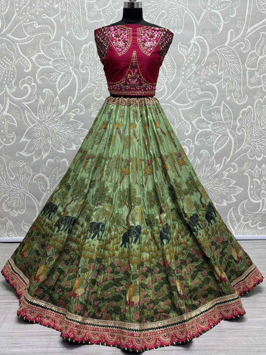 Green printed lehenga with elephant motifs and maroon embroidered blouse, Indian ethnic wear