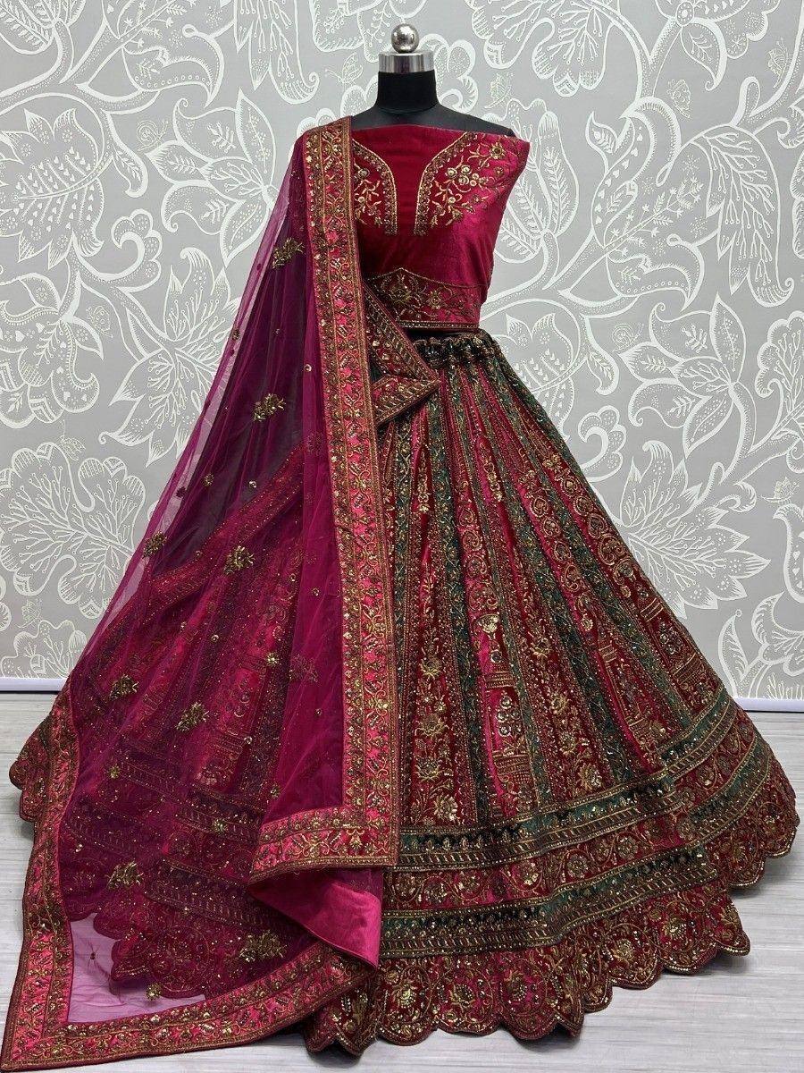 Maroon designer lehenga choli with gold embroidery and matching dupatta, ideal for weddings and festive occasions