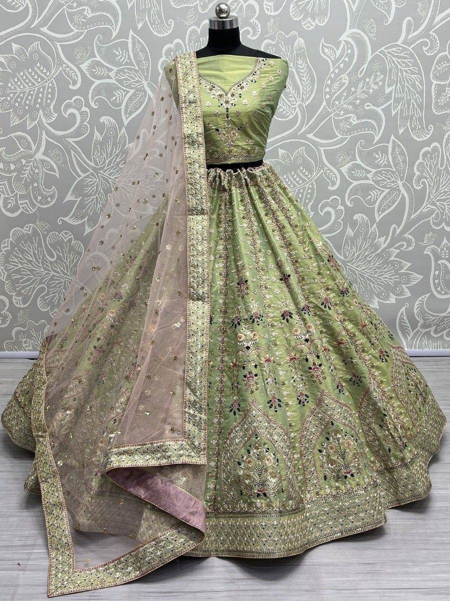 Green embroidered lehenga choli with net dupatta, Indian ethnic wear for weddings and festivals