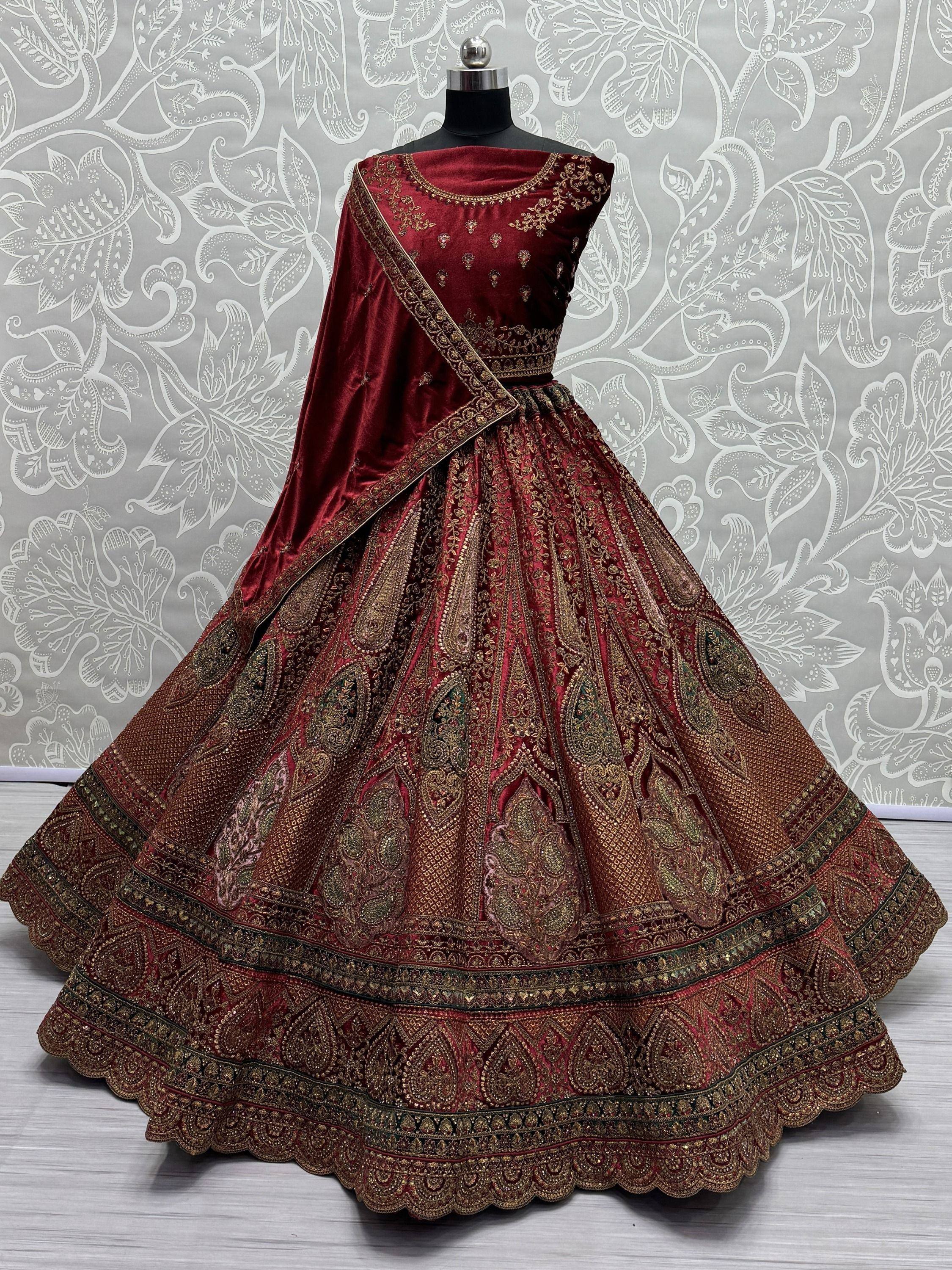 Maroon velvet lehenga choli with gold embroidery, designer Indian ethnic wear for weddings