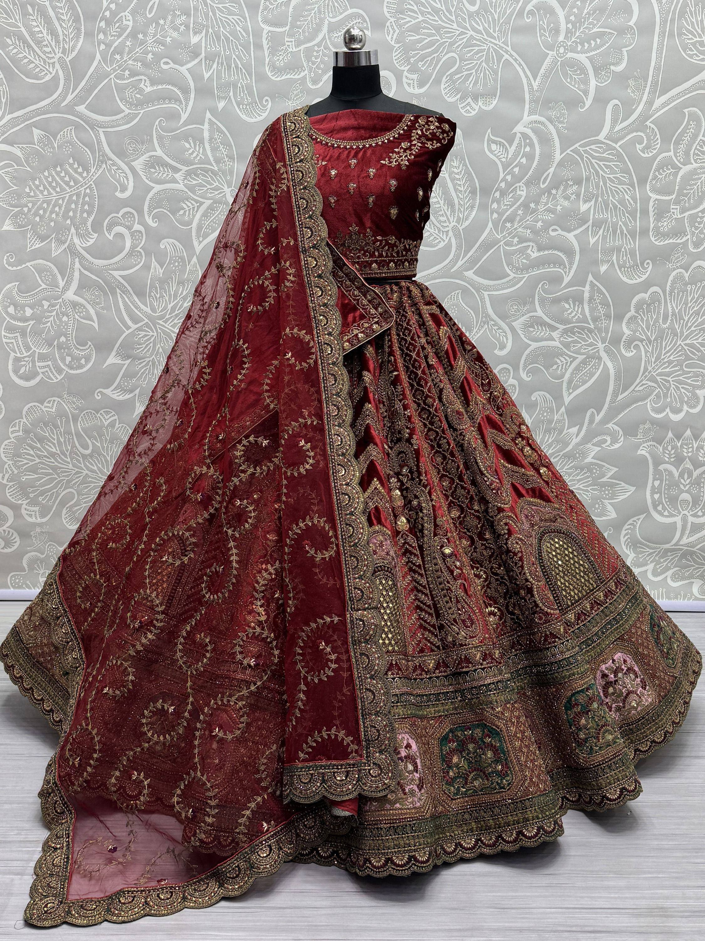 Maroon velvet designer lehenga choli with gold embroidery and matching dupatta, ethnic Indian wear