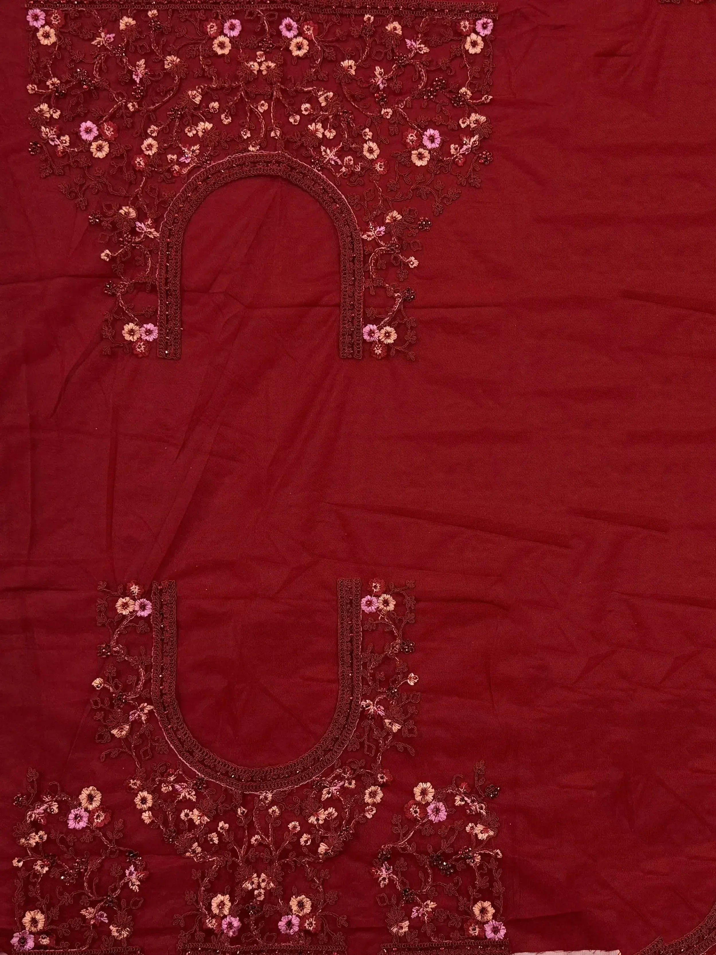 Maroon ethnic wear with floral embroidery and sequin detailing on neckline and hem