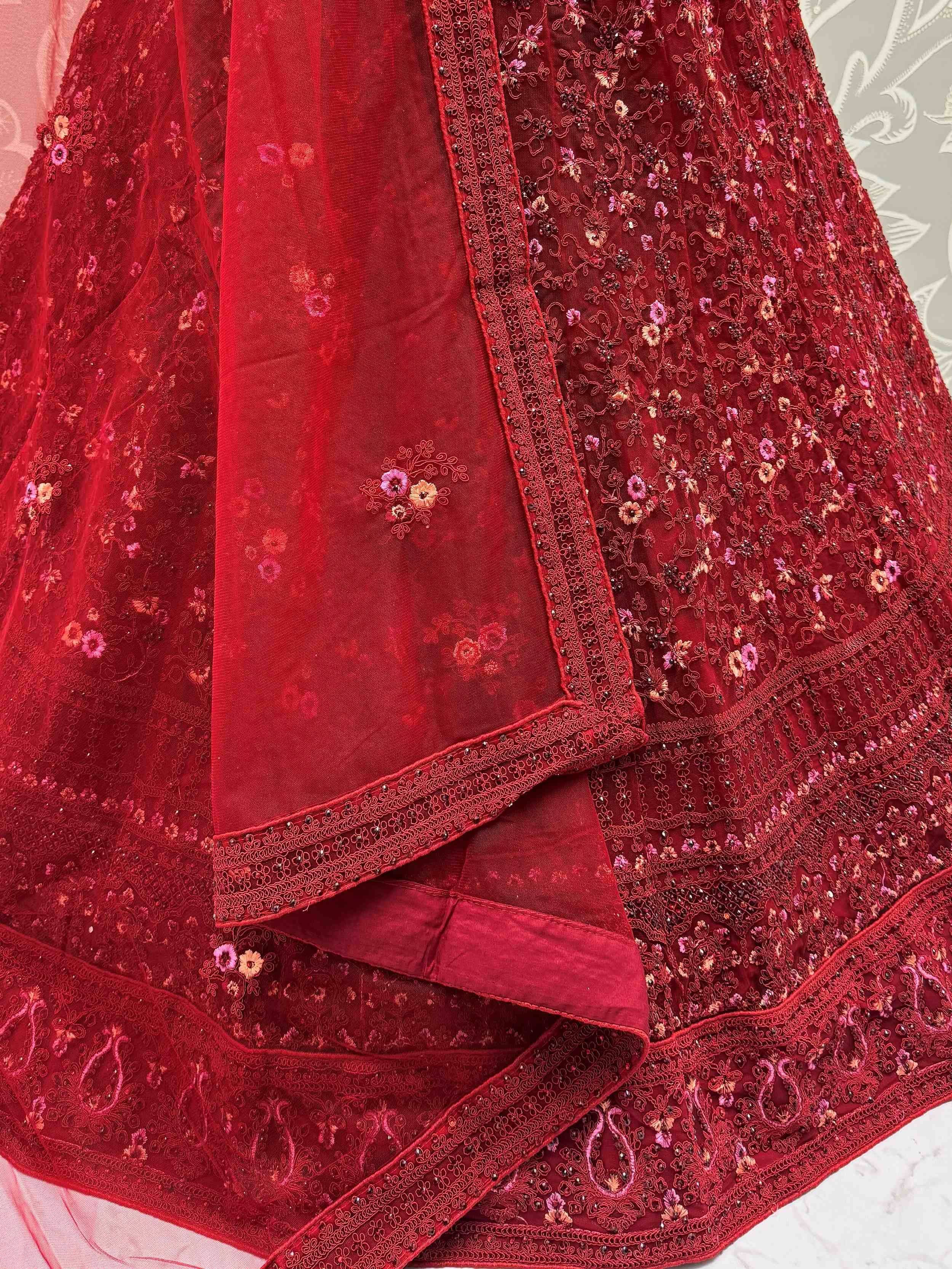 Red embroidered lehenga choli with floral beadwork and sheer dupatta, Indian ethnic wear