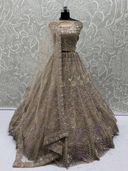 Beautiful Golden Net Sequins Bridal Wear Lehenga Choli With Dupatta