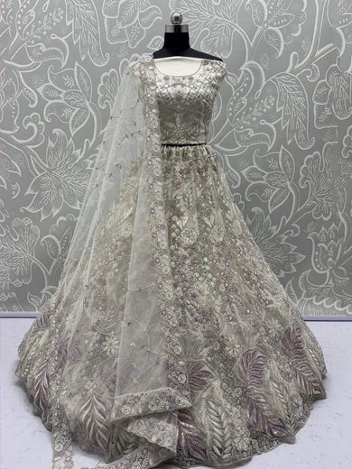 Dazzling White Multi-Thread Work Net Bridal Wear Lehenga Choli