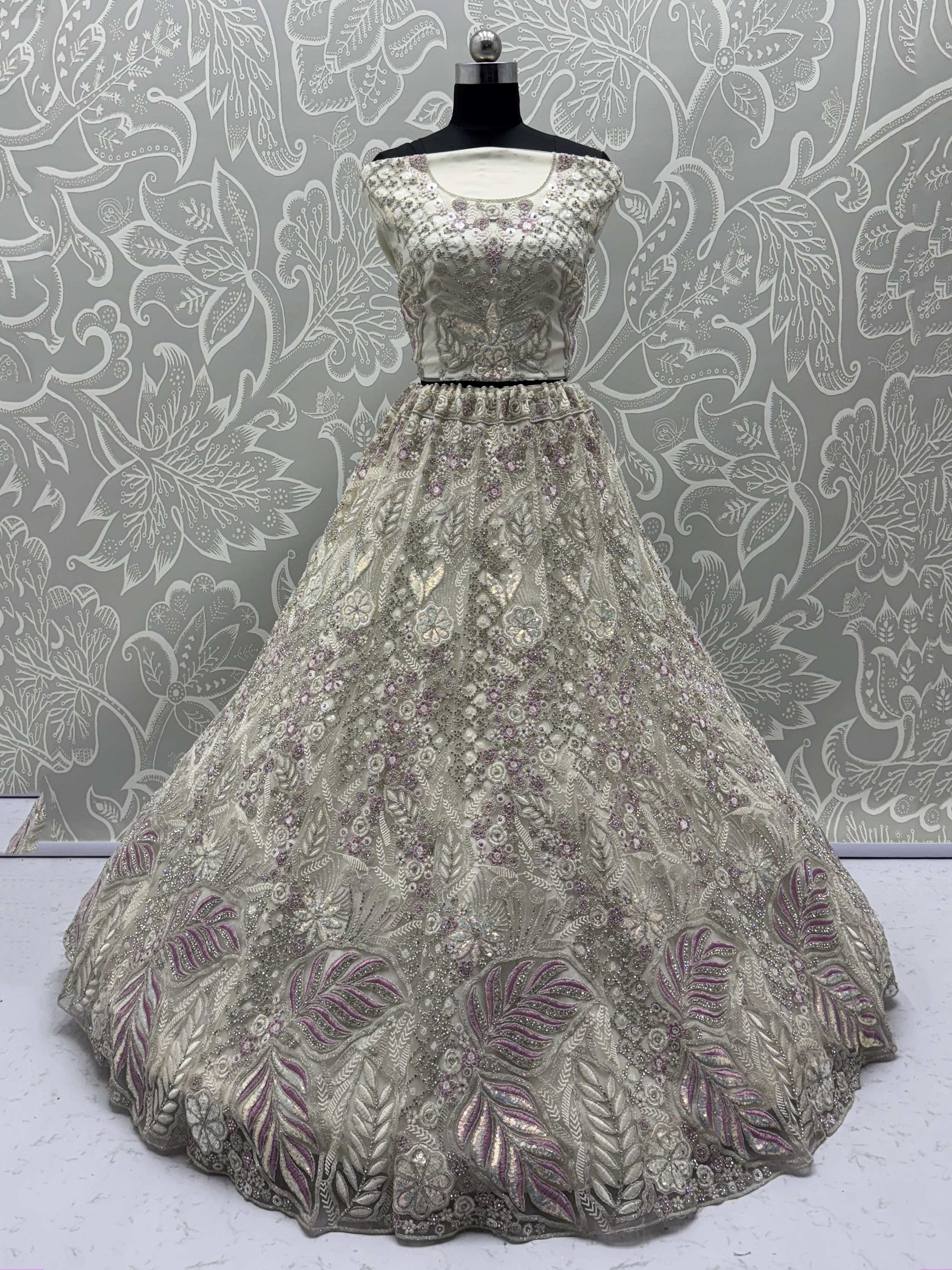 Dazzling White Multi-Thread Work Net Bridal Wear Lehenga Choli