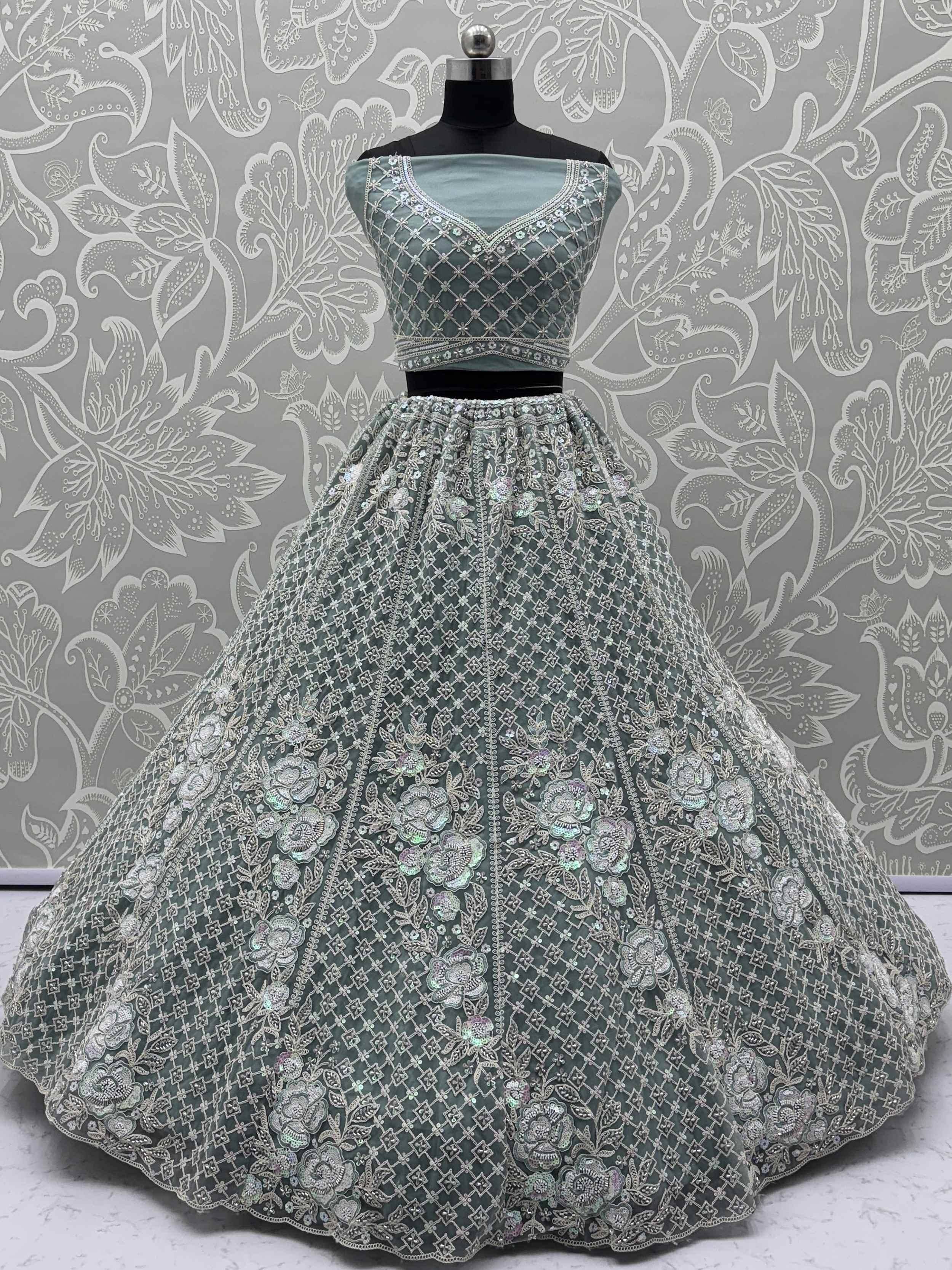 Mint green designer lehenga choli with heavy floral embroidery and sequin work for weddings