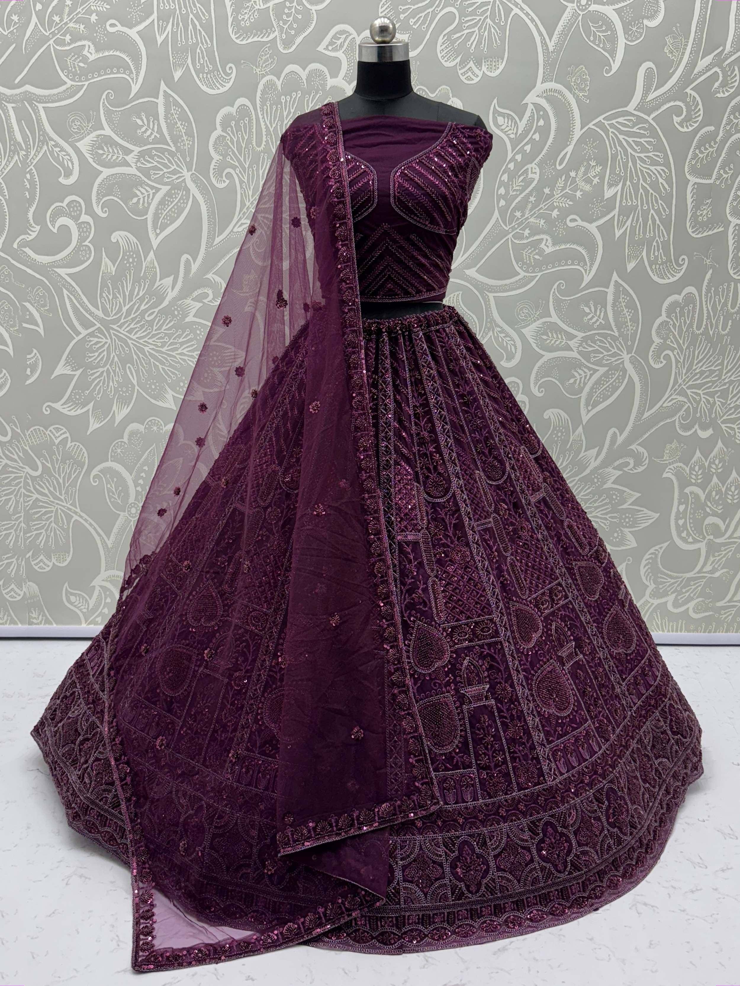 Purple designer lehenga choli with heavy embroidery and sequins, perfect for Indian ethnic wear