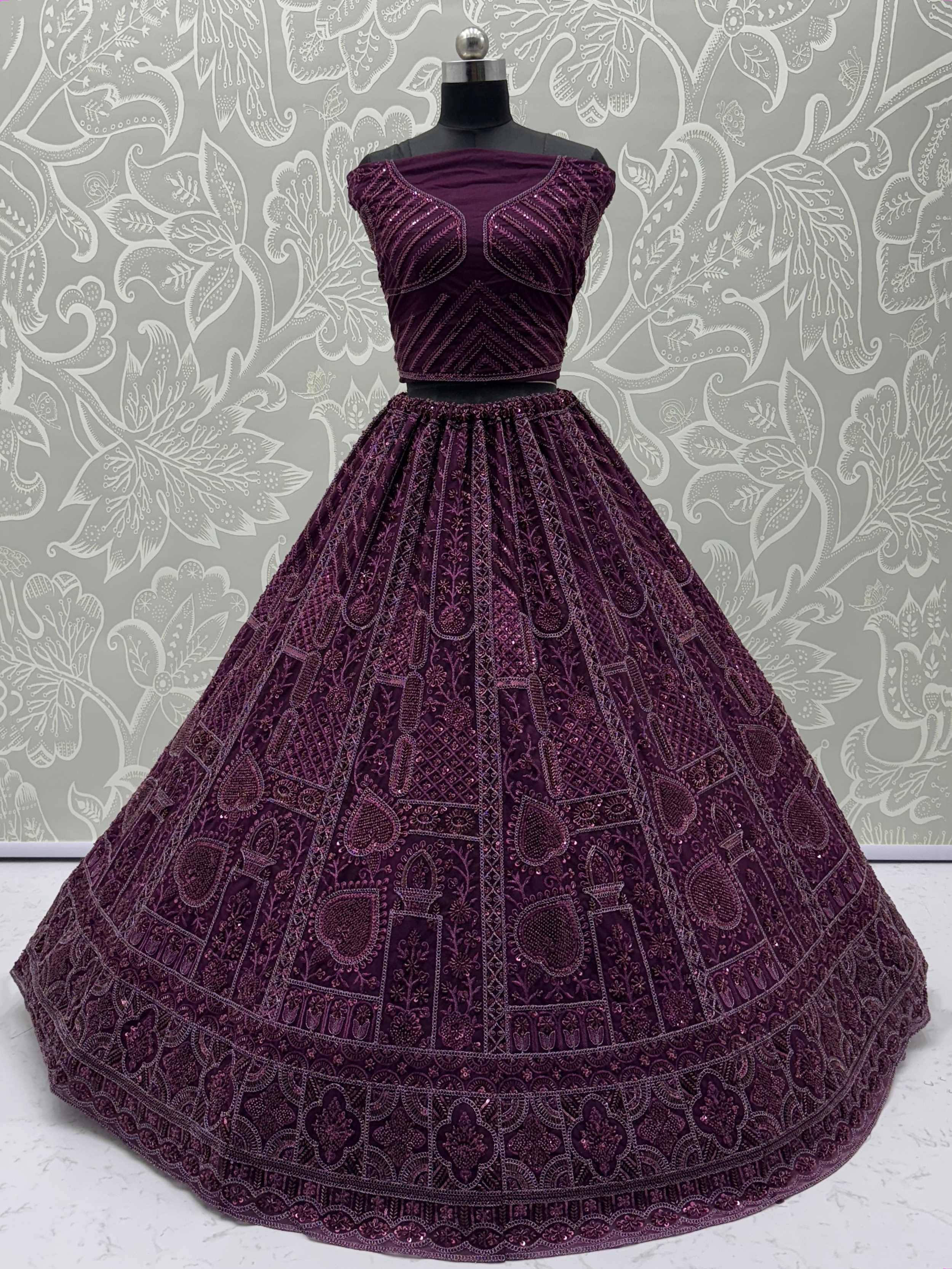 Stunning Purple Net Dori Embroidered Lehenga Choli With Dupatta