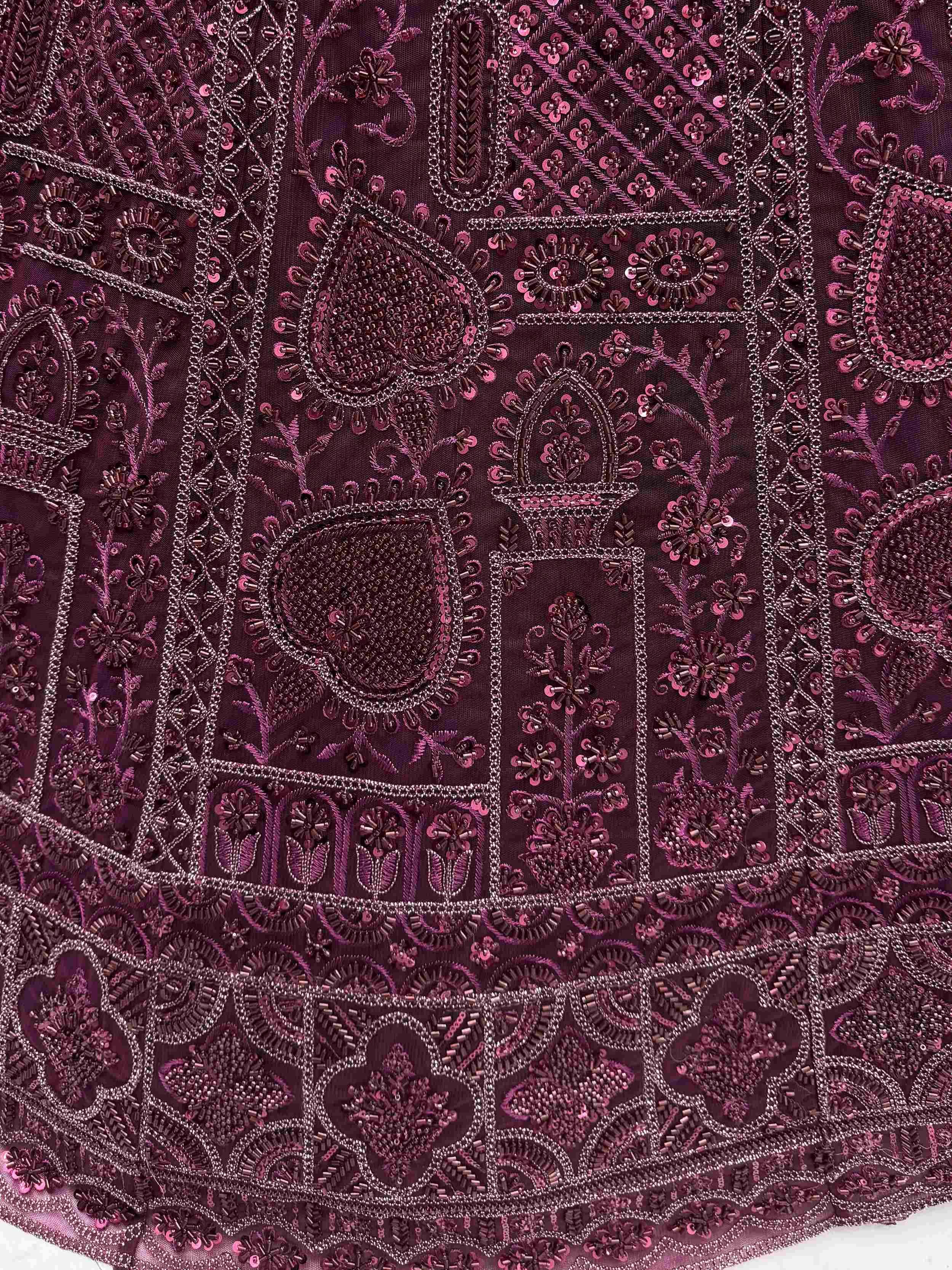 Stunning Purple Net Dori Embroidered Lehenga Choli With Dupatta
