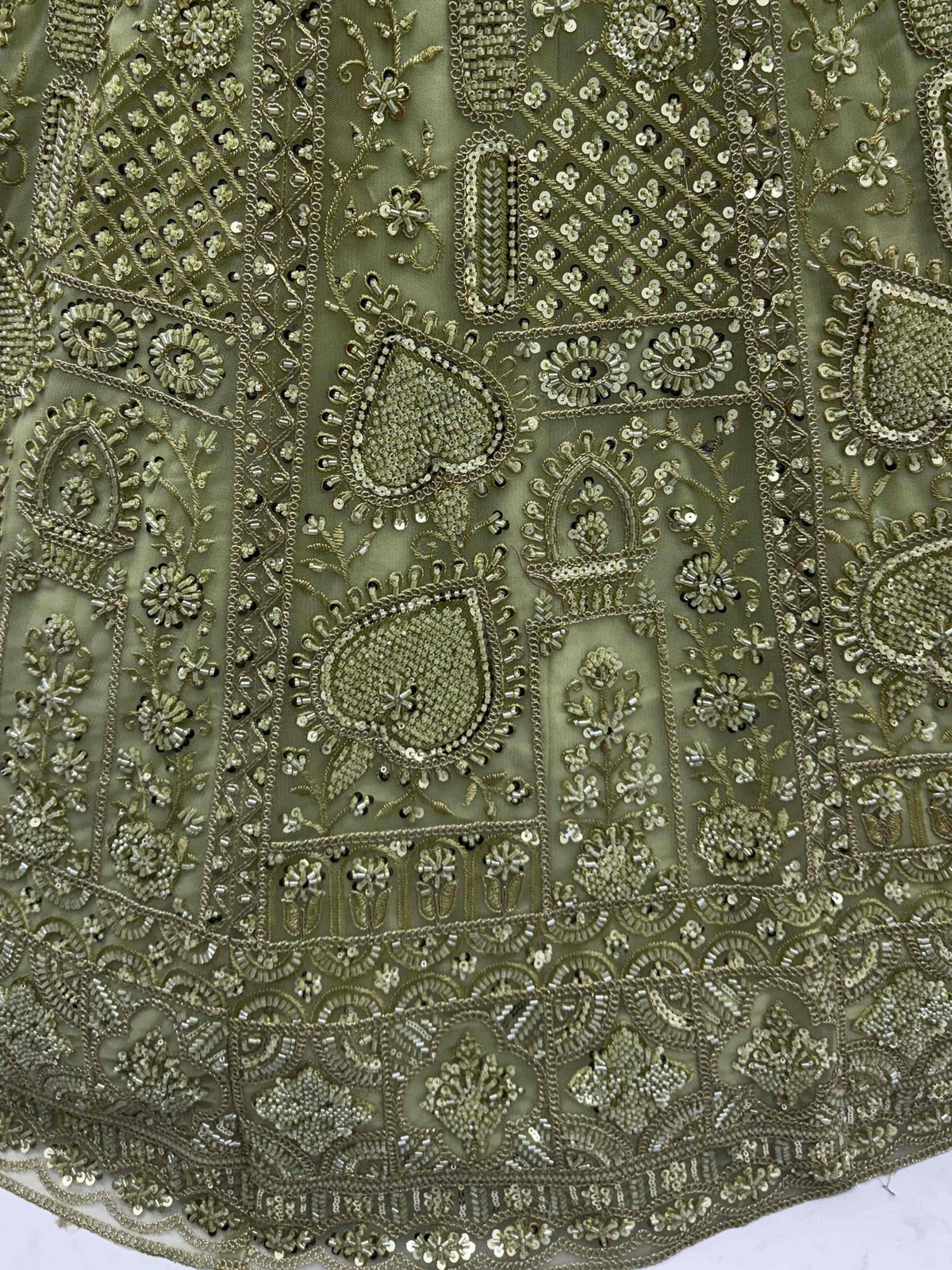 Olive green ethnic wear with intricate gold beadwork and floral embroidery, perfect for designer lehenga or saree.