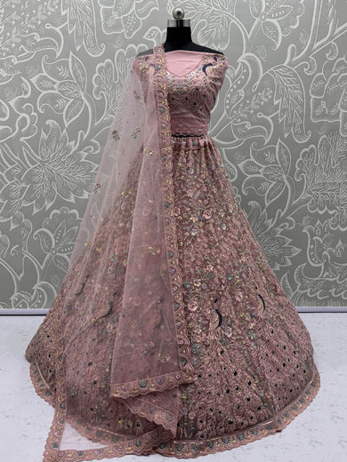 Magnetic Peach Net Sequins Wedding Wear Lehenga Choli With Dupatta