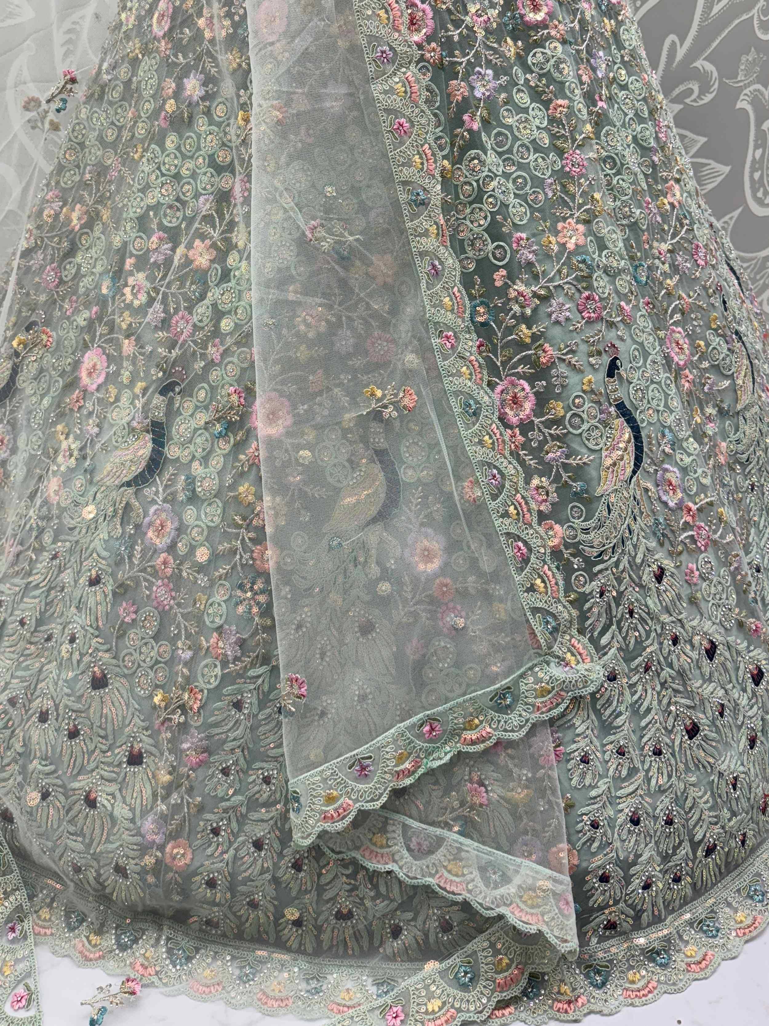 Grey designer lehenga with peacock and floral embroidery, perfect for Indian ethnic wear.