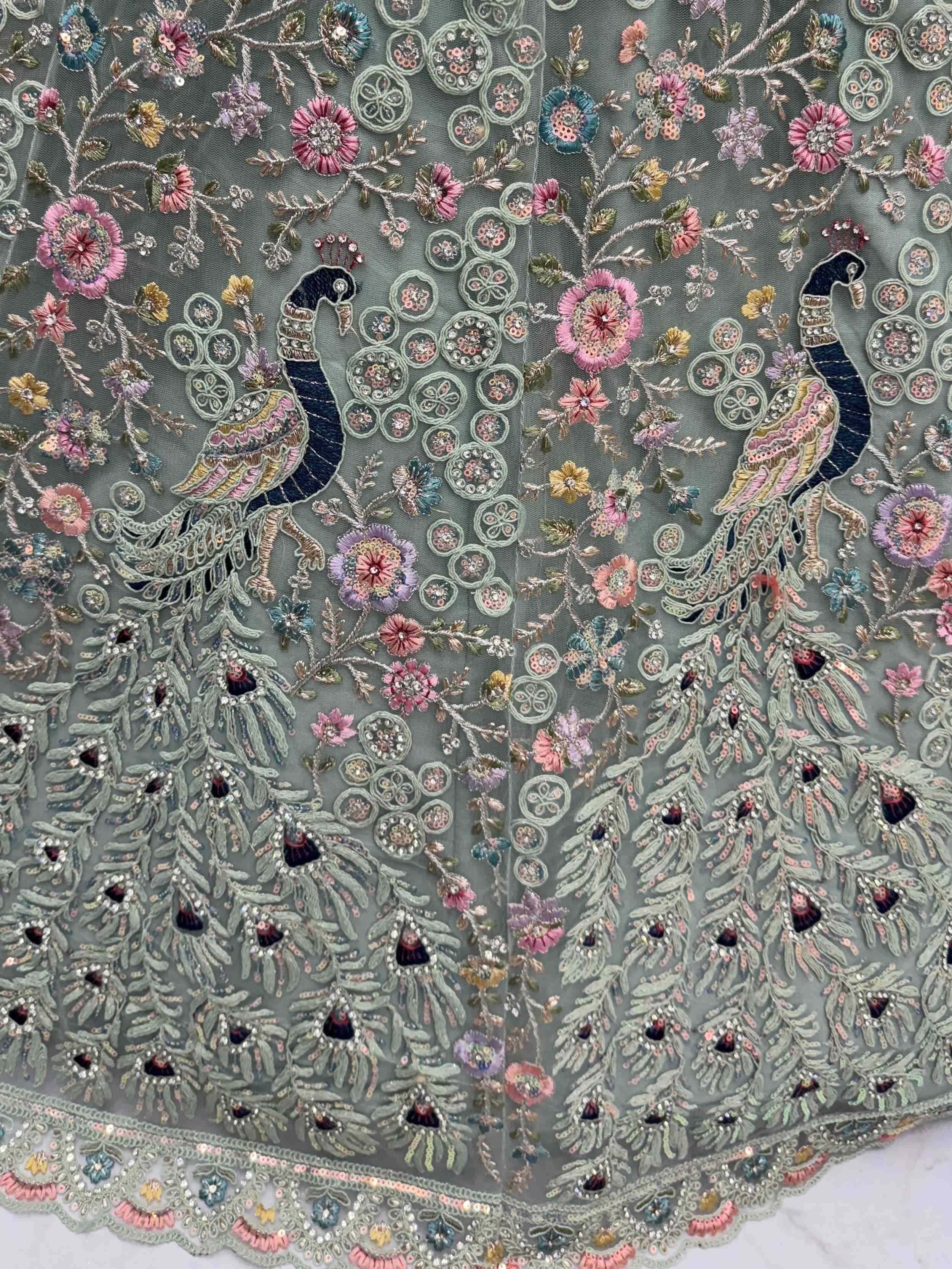 Peacock and floral embroidered ethnic wear fabric with sequins and beads