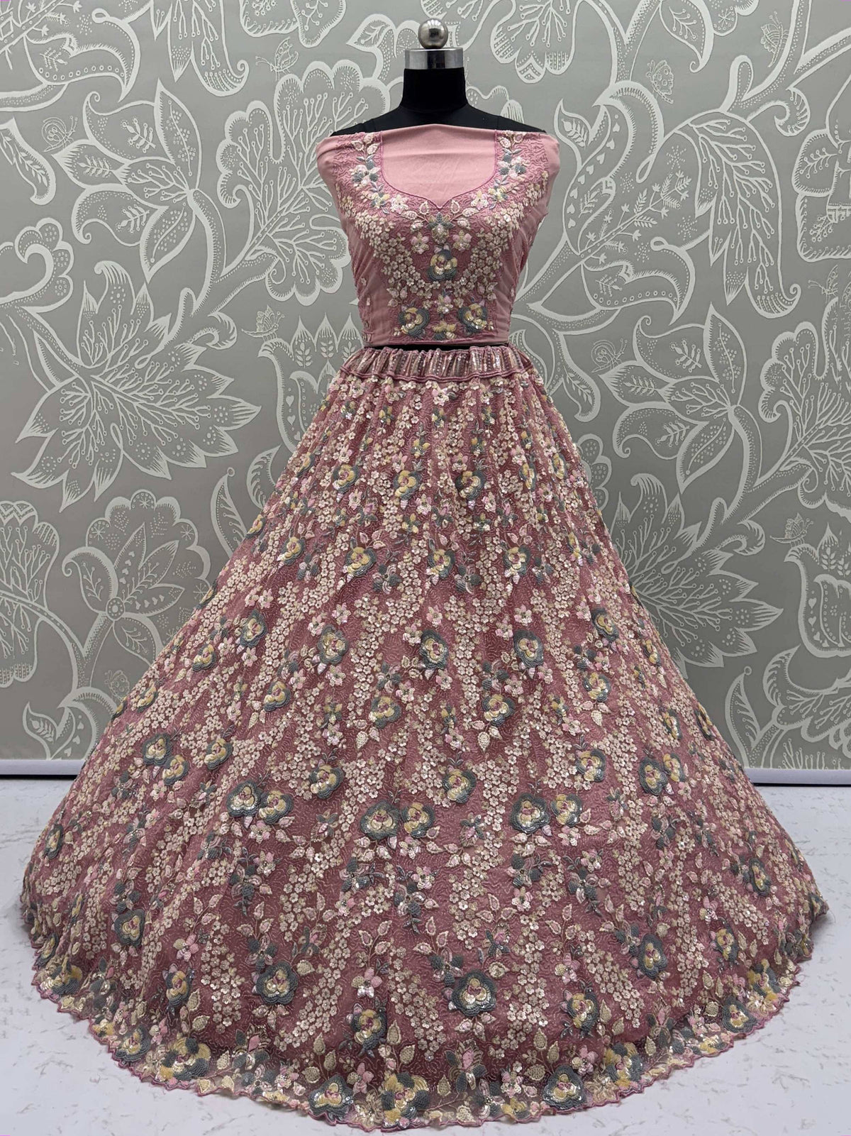 Pink floral embroidered lehenga choli with intricate detailing, perfect for ethnic occasions