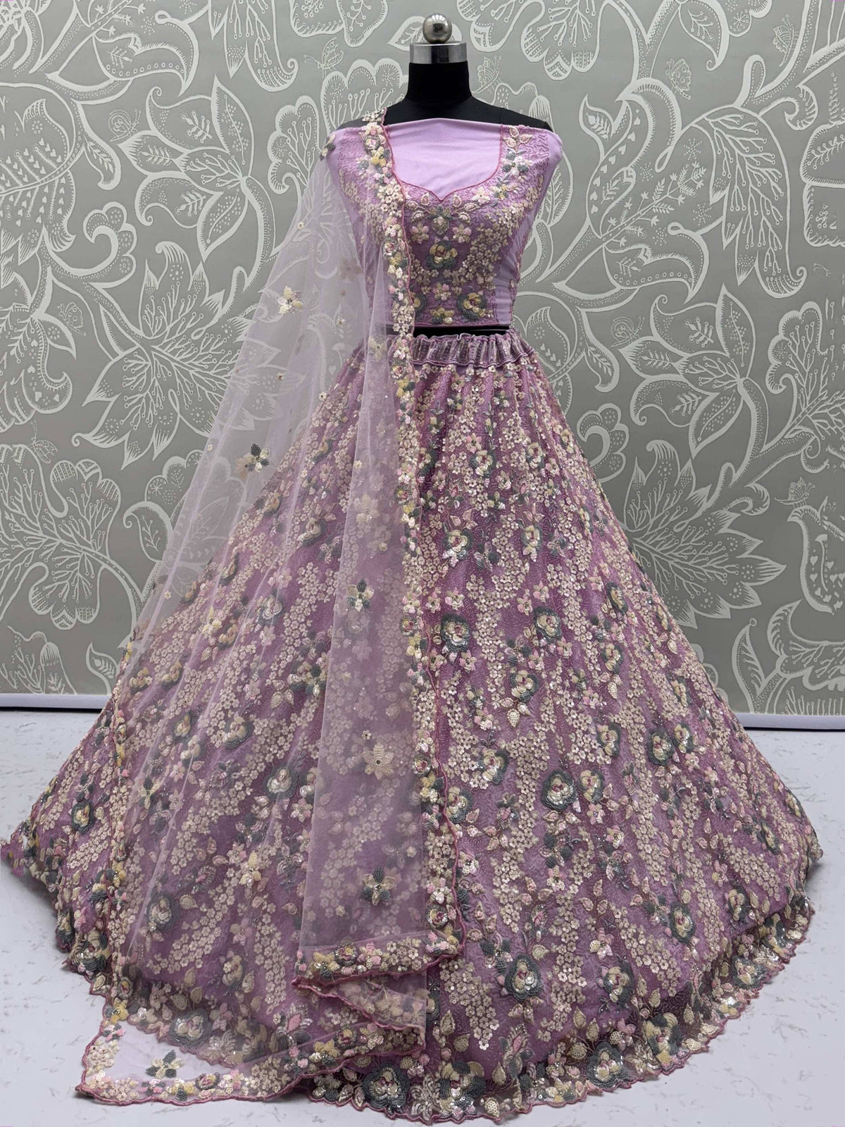 Purple floral embroidered lehenga choli with sheer dupatta, perfect for Indian ethnic wear events.