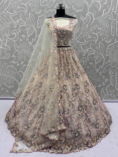 Bewitching Beige Net Embroidered Wedding Wear Lehenga Choli