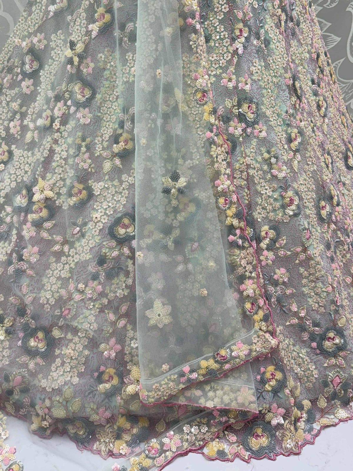 Elegant floral sequin embroidery on sheer fabric for designer lehenga or ethnic gown