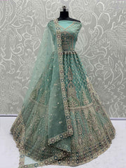 Mesmerizing Green Net Stone Work Reception Wear Lehenga Choli