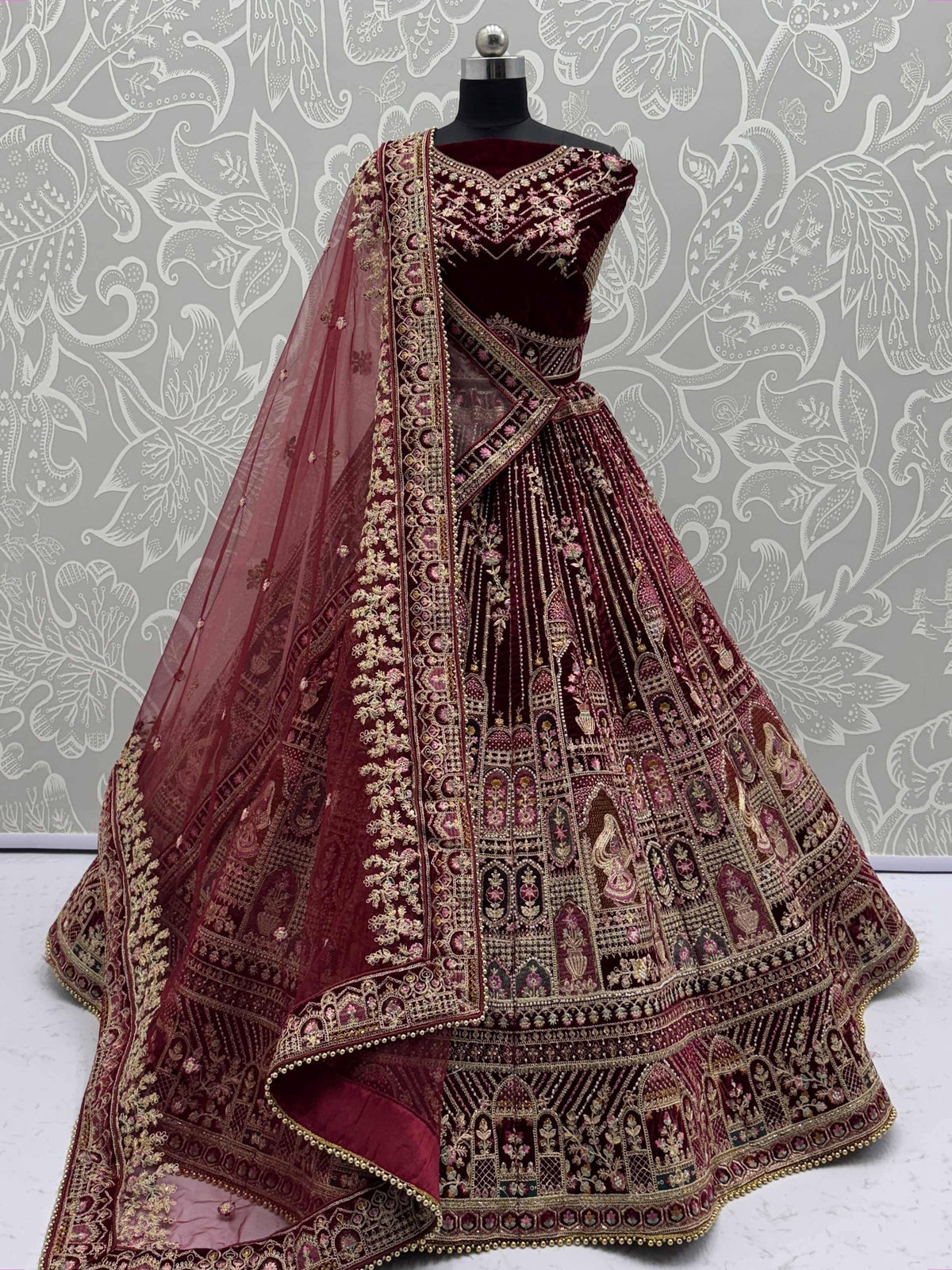 Maroon velvet designer lehenga choli with heavy gold embroidery and net dupatta, Indian ethnic wear