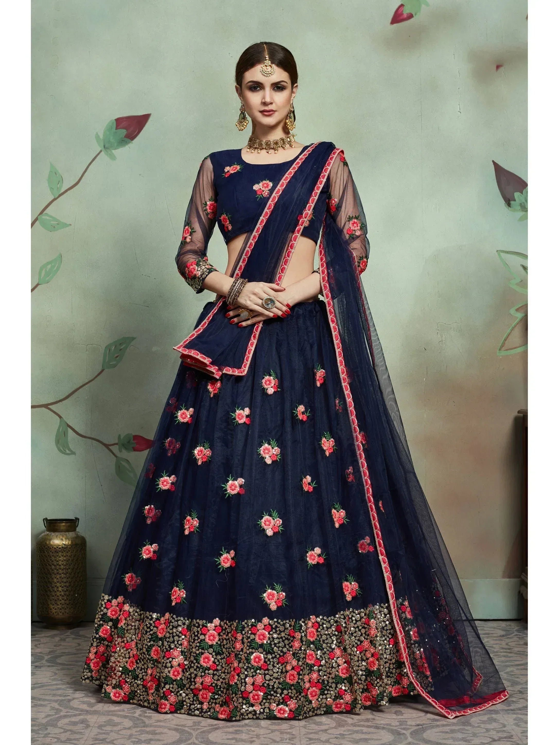 Navy blue lehenga choli with floral embroidery and sheer sleeves, perfect for Indian ethnic occasions