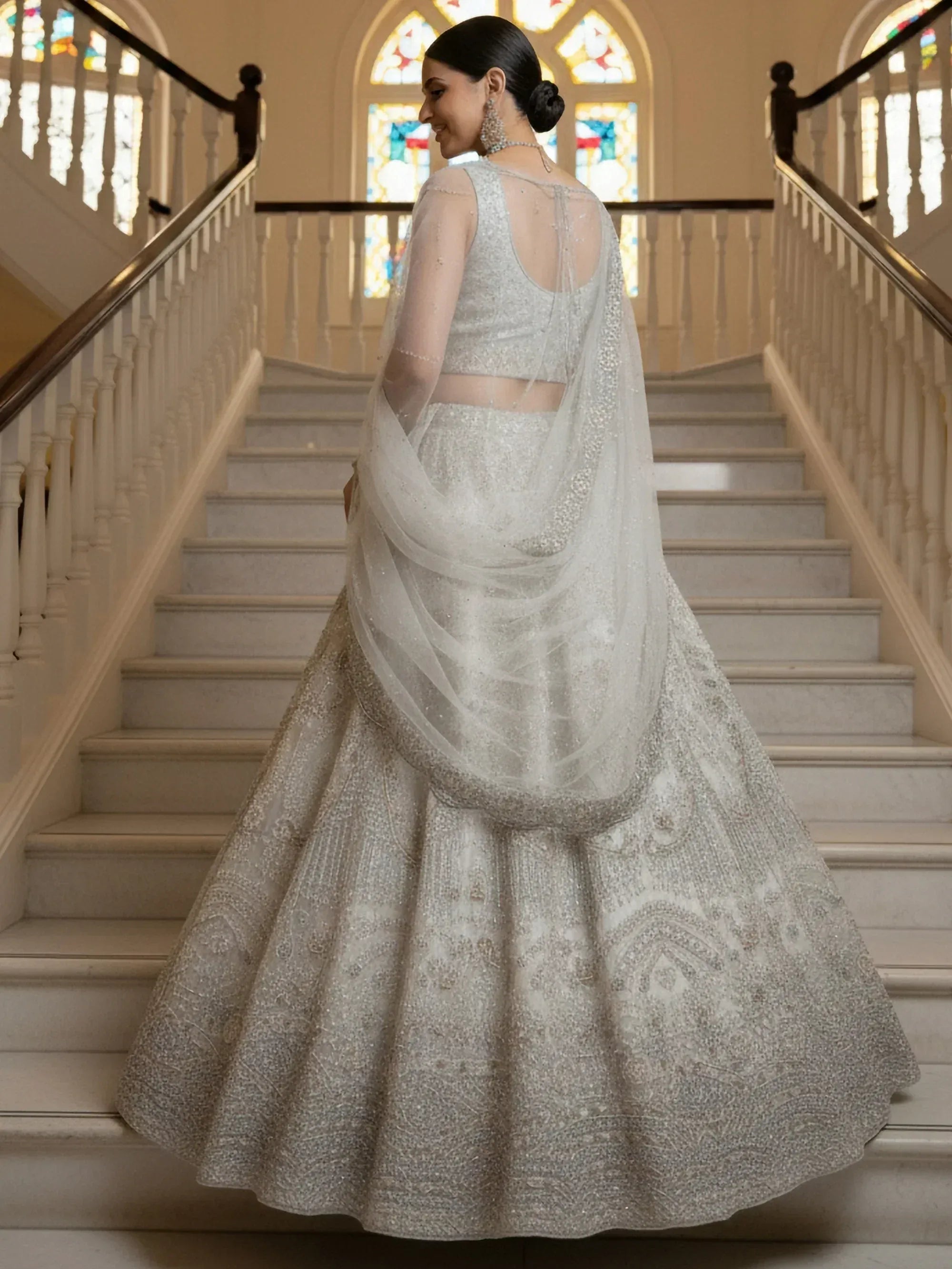 Awesome White Thread Embroidered Net Engagement Wear Lehenga Choli