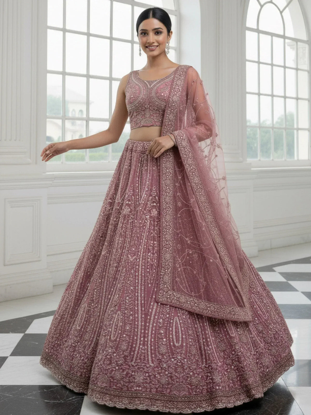 Elegant pink embroidered lehenga choli with sheer dupatta, perfect for Indian ethnic wear
