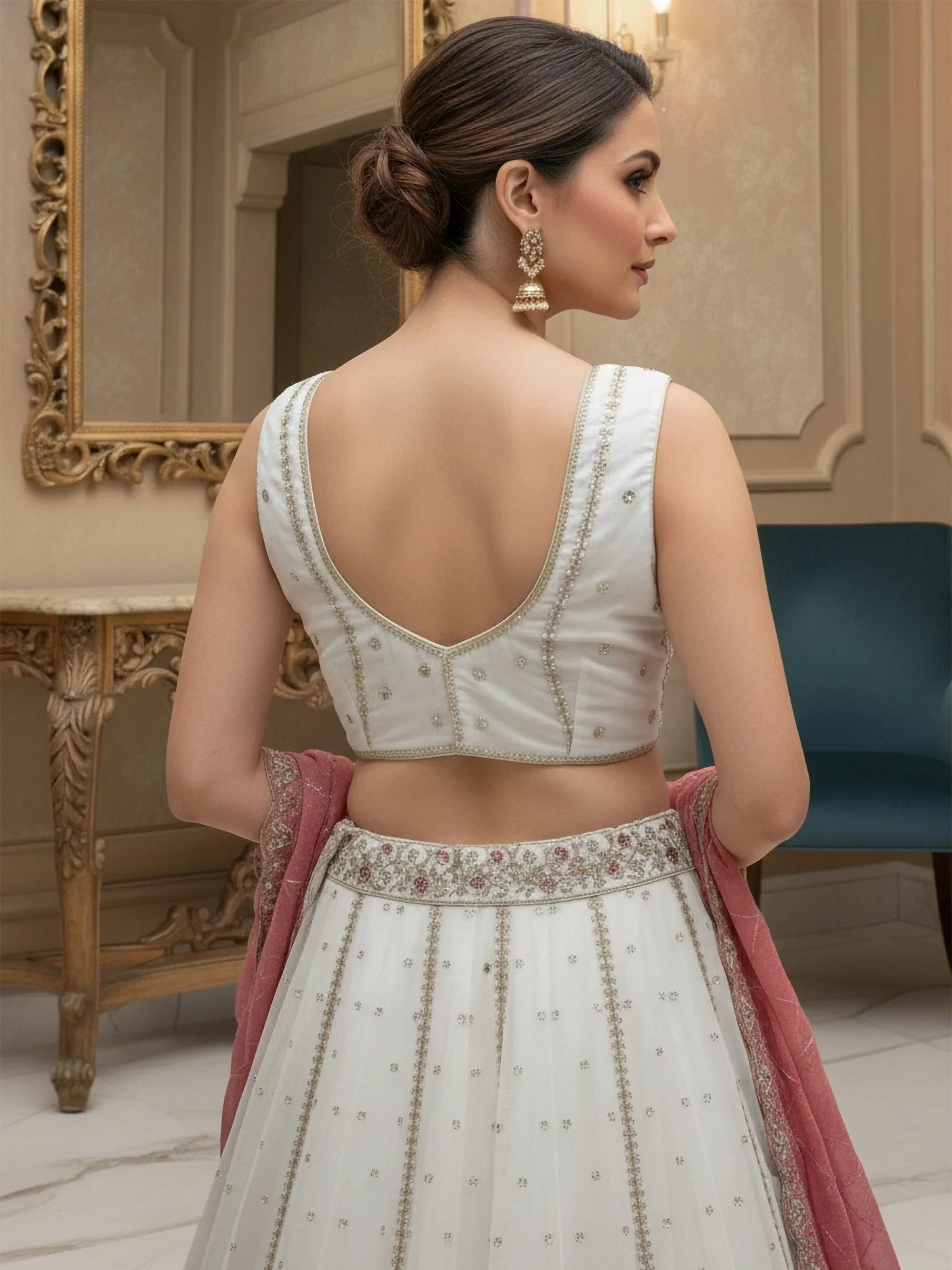 Glowing White Sequins Embroidered Silk Reception Wear Lehenga Choli