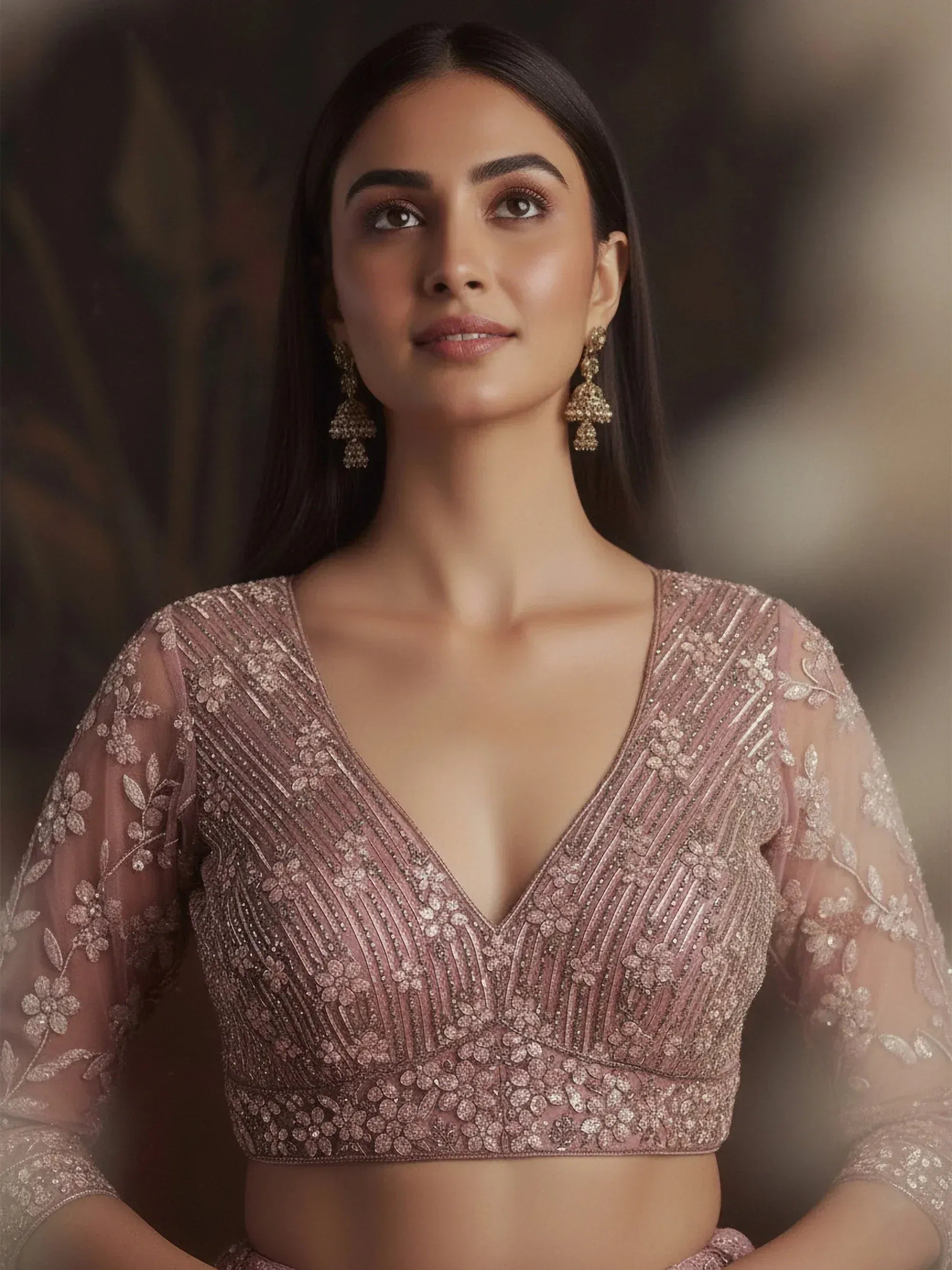 Stunning Pink Sequins Embroidered Net Engagement Wear Lehenga Choli