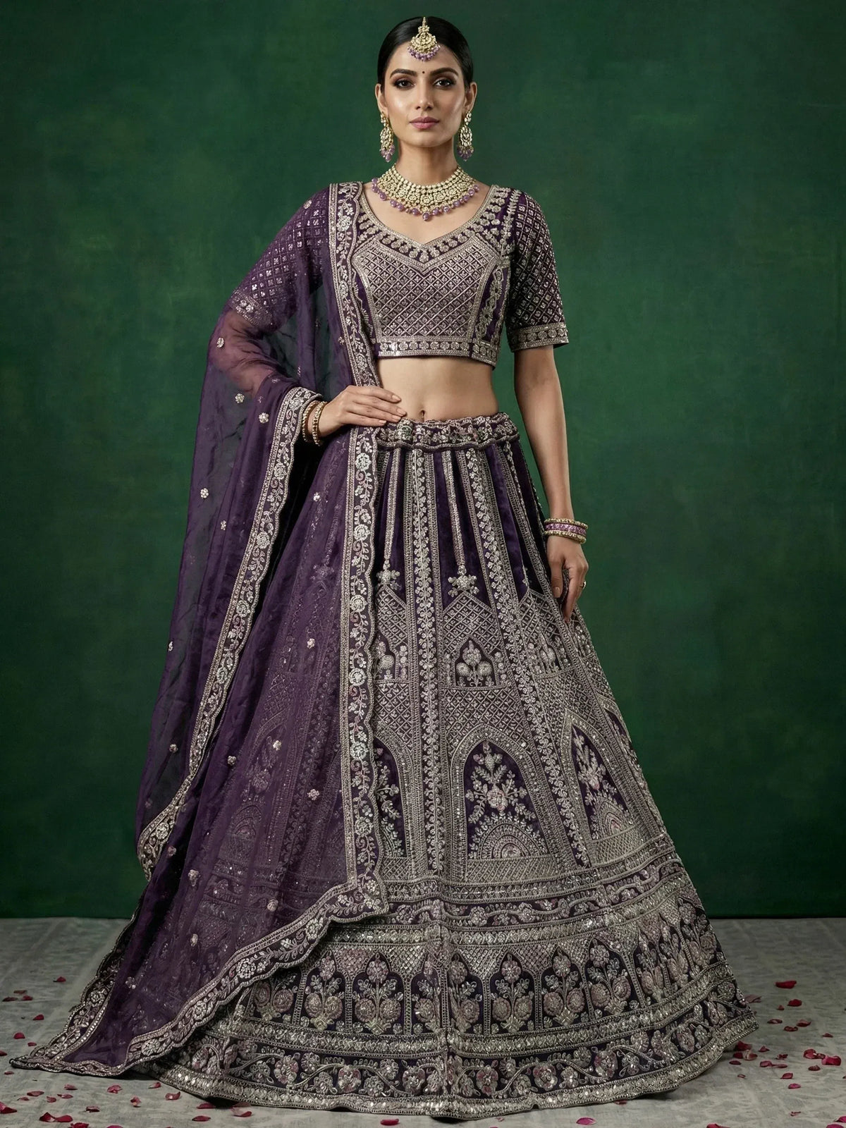 Purple embroidered lehenga choli with heavy zari work, perfect for weddings and festive occasions