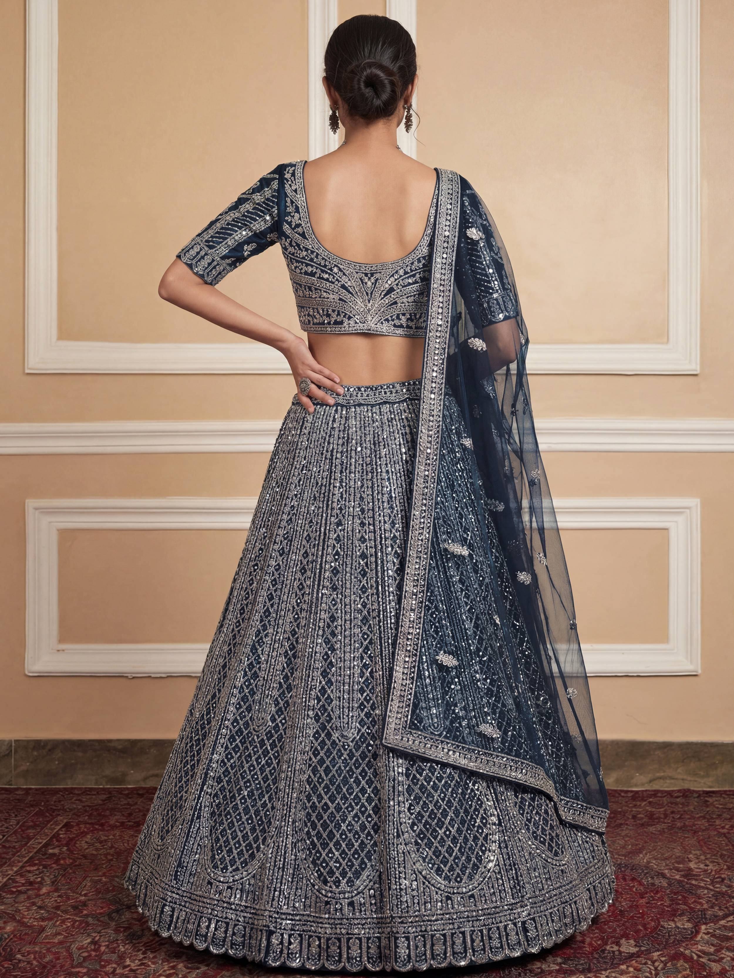 Elegant Blue Sequins Embroidered Net Party Wear Lehenga Choli