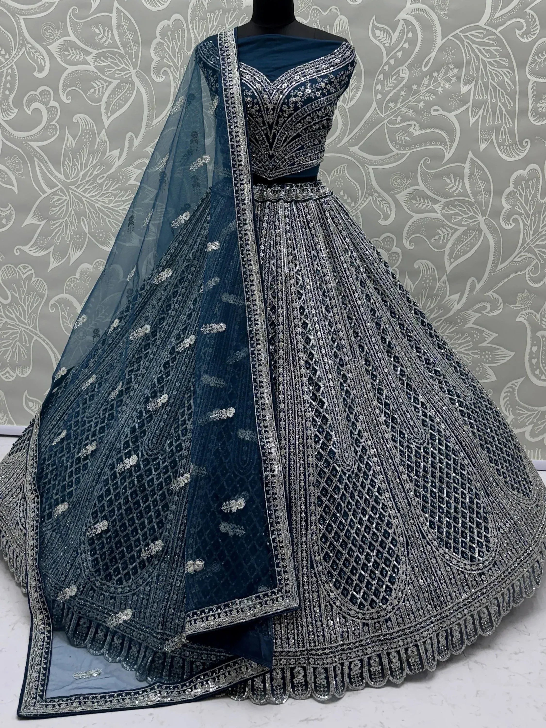 Elegant Blue Sequins Embroidered Net Party Wear Lehenga Choli