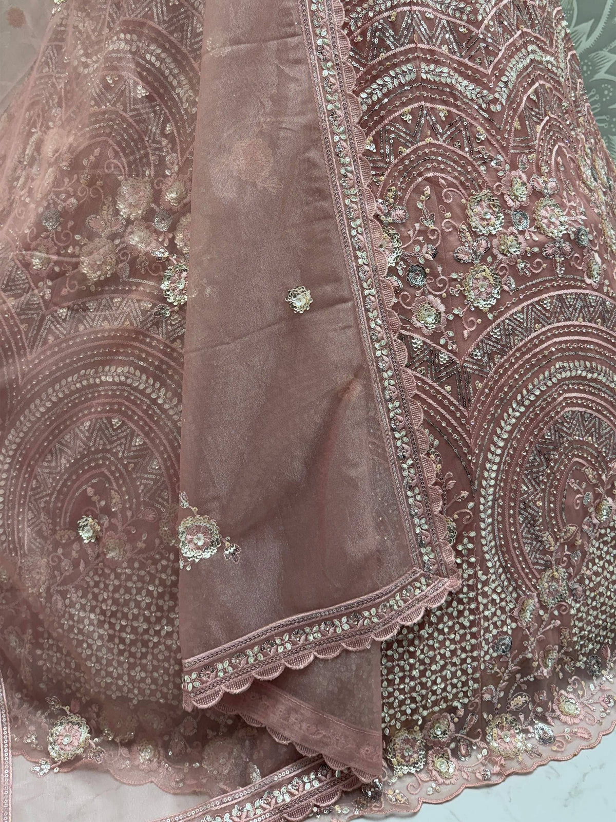 Dusty rose designer lehenga with intricate sequin and floral embroidery, scalloped lace border