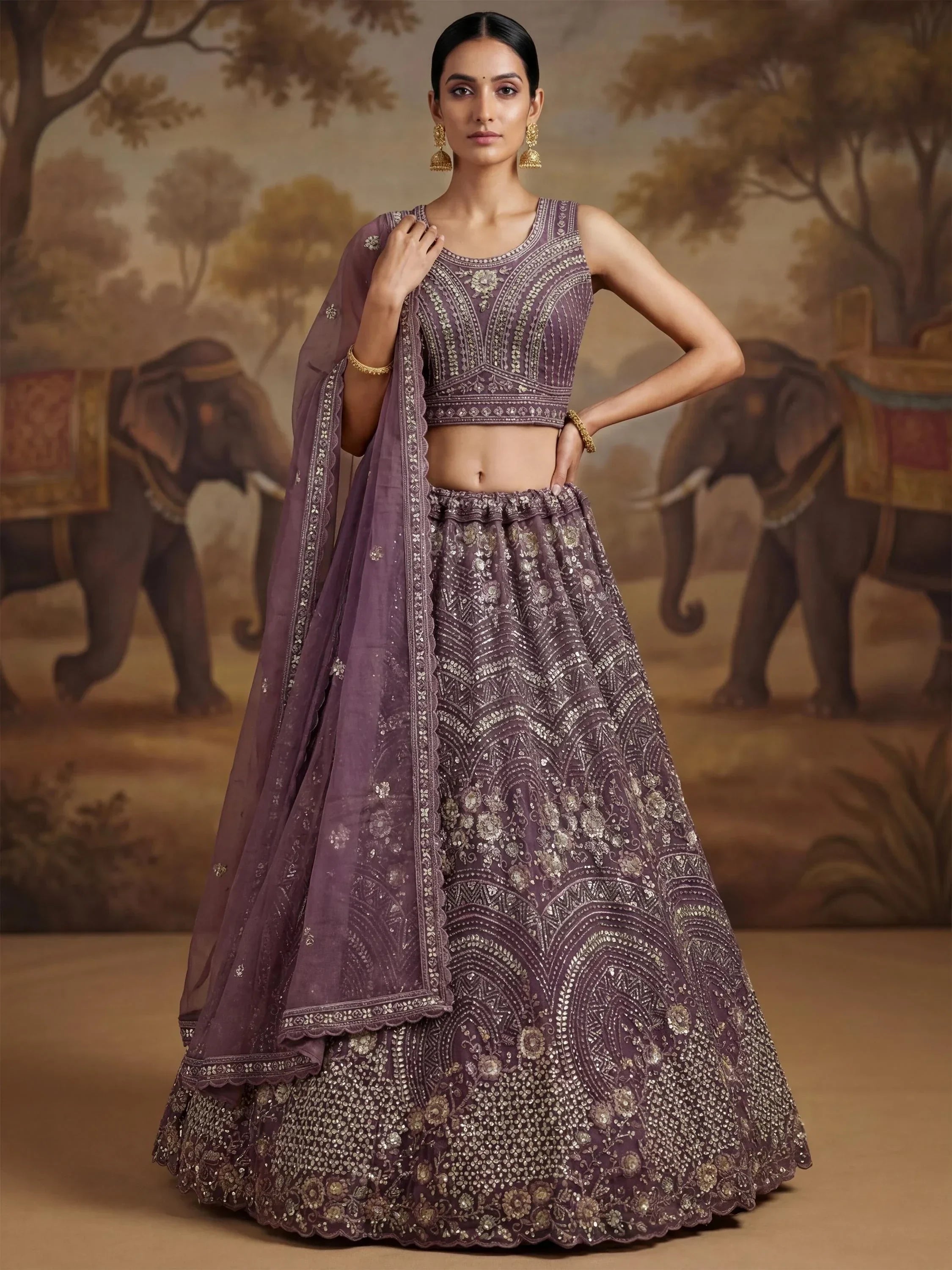 Charming Purple Embroidered Net Engagement Wear Lehenga Choli