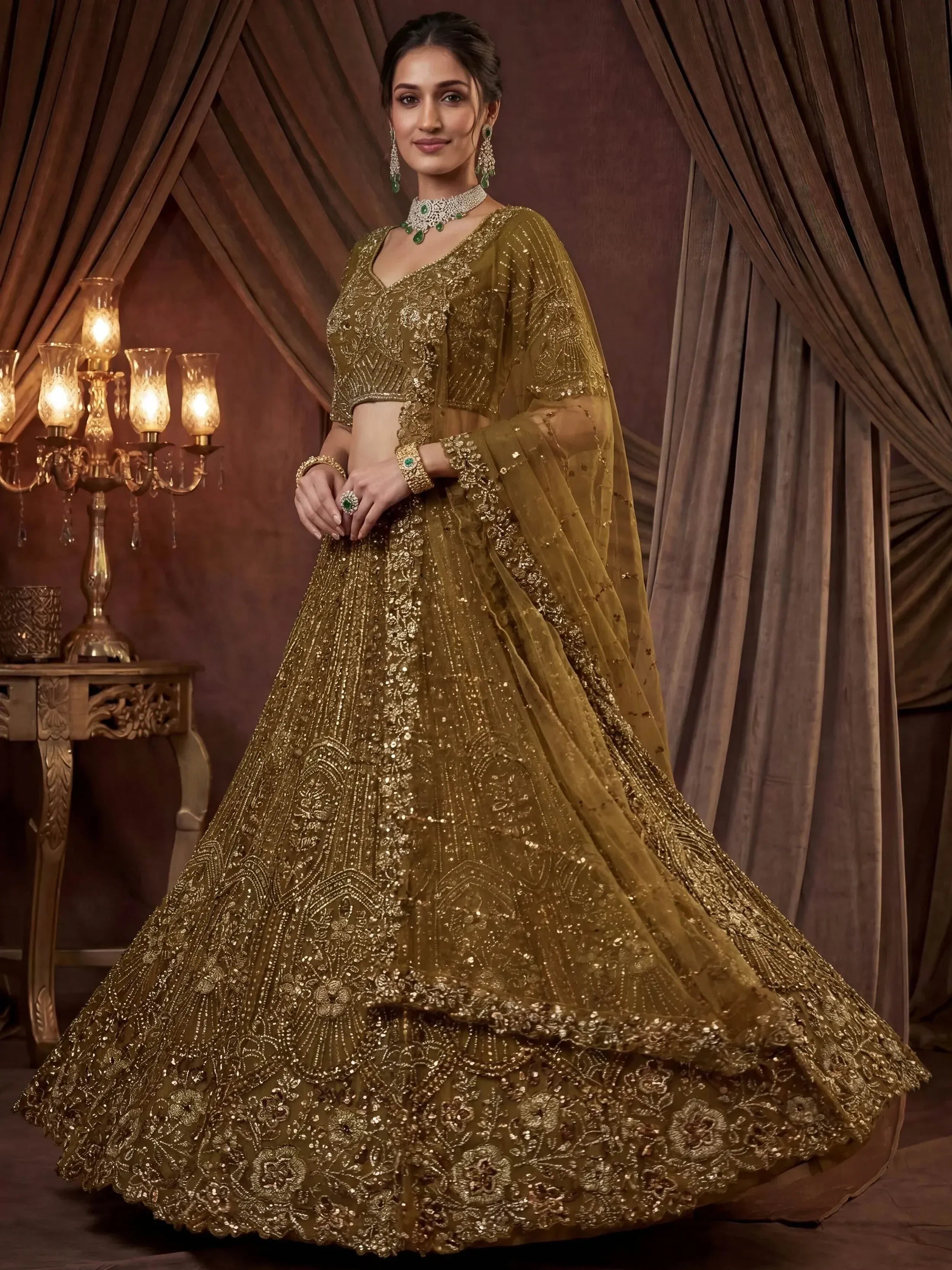 Captivating Green Embroidered Net Wedding Wear Lehenga Choli