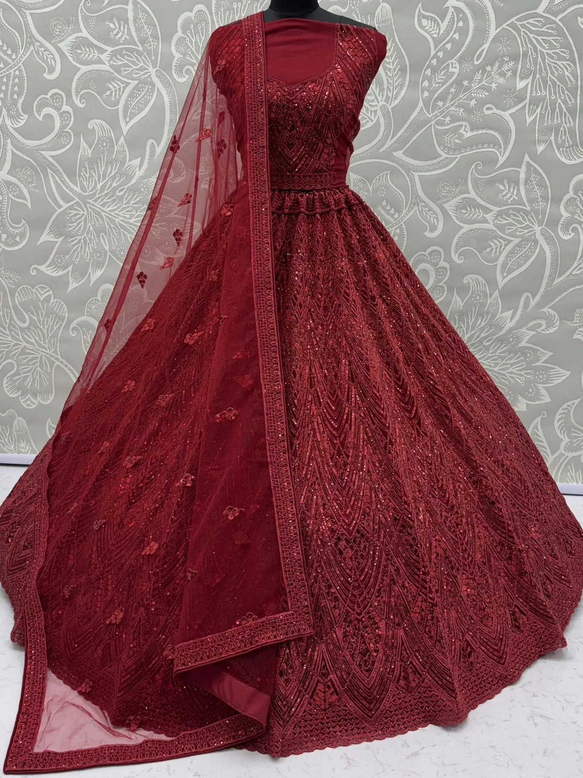 Red sequin lehenga choli with matching dupatta, ethnic Indian wear for weddings and parties